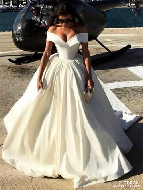 white off the shoulder wedding dress